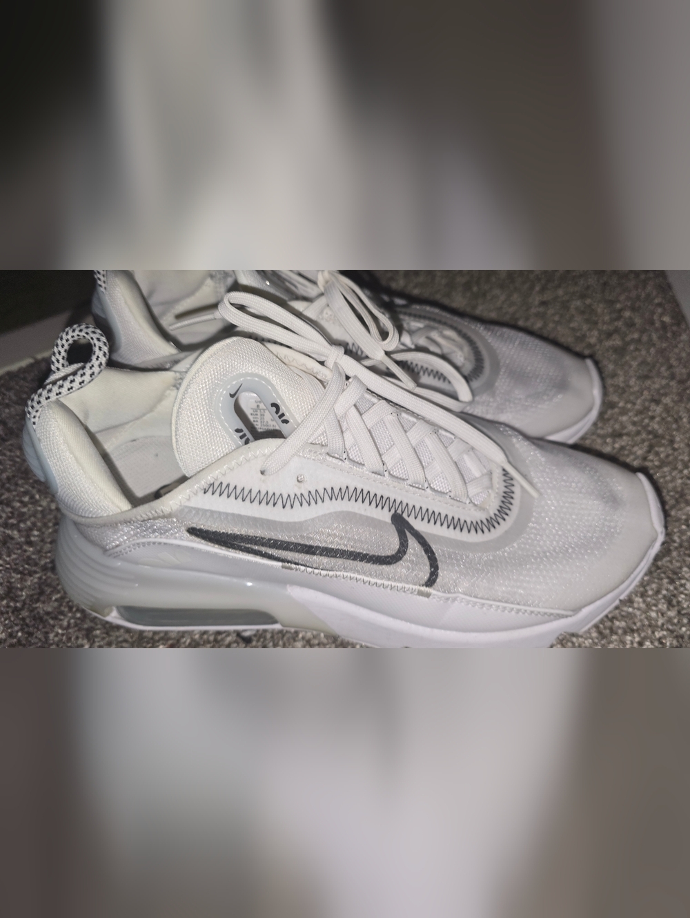 Nike Women's White Sneakers with Black Swoosh